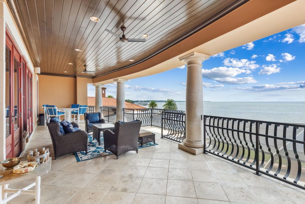 Featured on HGTV's Extreme Homes, this Tuscan-inspired masterpiece sits on a sprawling 1.87-acre lot, boasting over 400 feet of stunning water frontage along Choctawhatchee Bay and Jones Bayou.