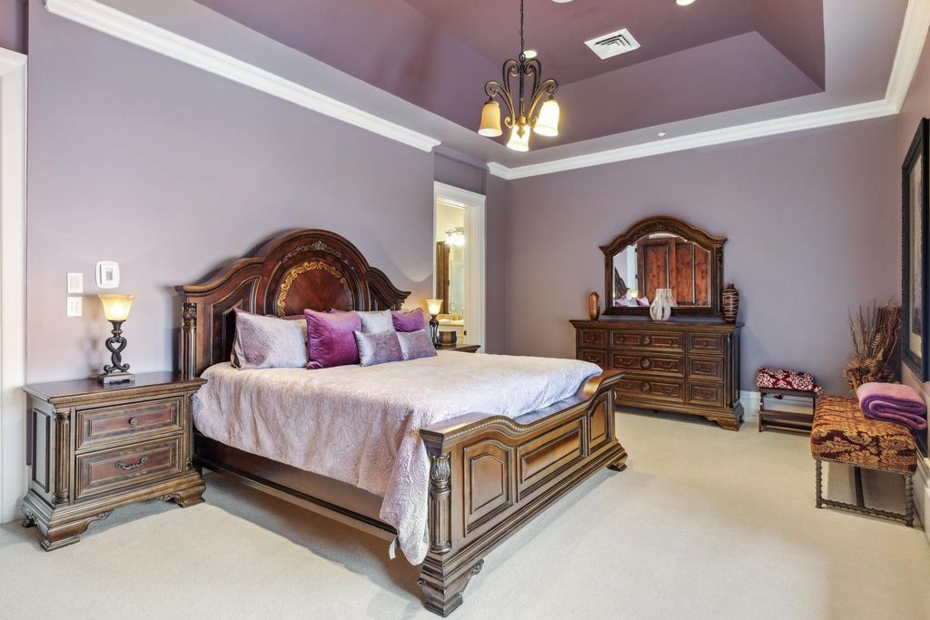 Featured on HGTV's Extreme Homes, this Tuscan-inspired masterpiece sits on a sprawling 1.87-acre lot, boasting over 400 feet of stunning water frontage along Choctawhatchee Bay and Jones Bayou.