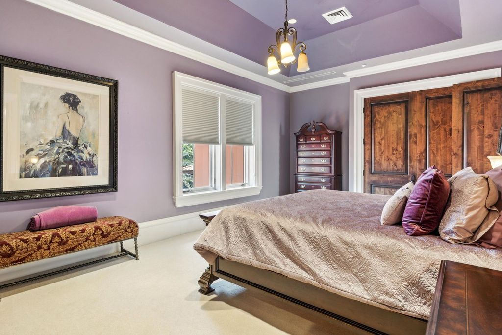 Featured on HGTV's Extreme Homes, this Tuscan-inspired masterpiece sits on a sprawling 1.87-acre lot, boasting over 400 feet of stunning water frontage along Choctawhatchee Bay and Jones Bayou.