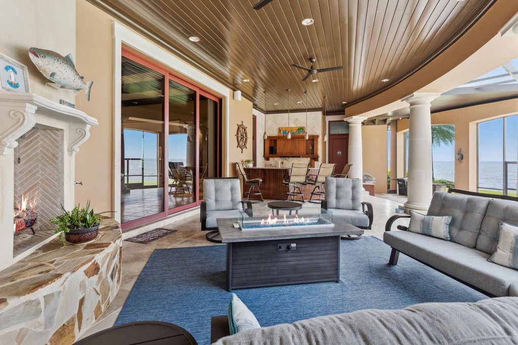 Featured on HGTV's Extreme Homes, this Tuscan-inspired masterpiece sits on a sprawling 1.87-acre lot, boasting over 400 feet of stunning water frontage along Choctawhatchee Bay and Jones Bayou.