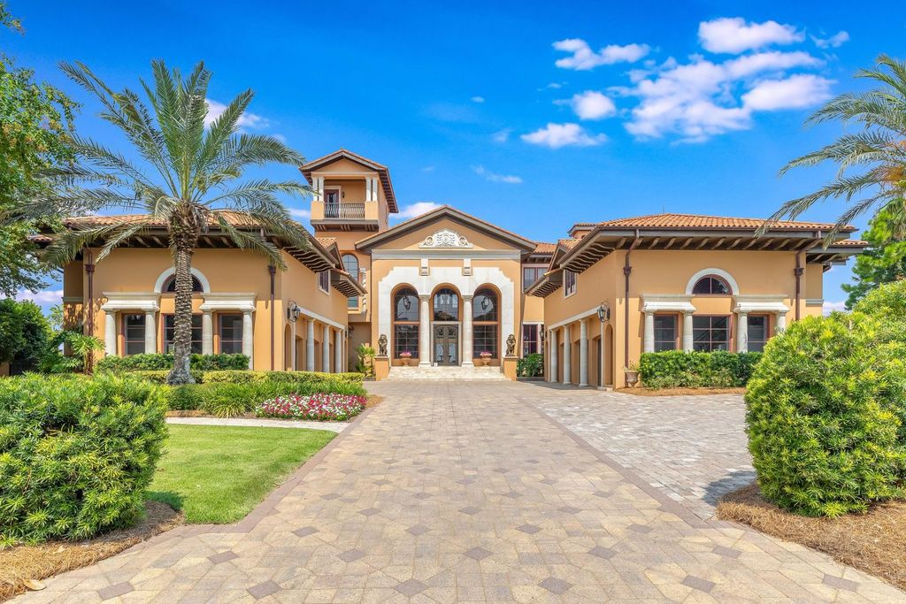 Featured on HGTV's Extreme Homes, this Tuscan-inspired masterpiece sits on a sprawling 1.87-acre lot, boasting over 400 feet of stunning water frontage along Choctawhatchee Bay and Jones Bayou.