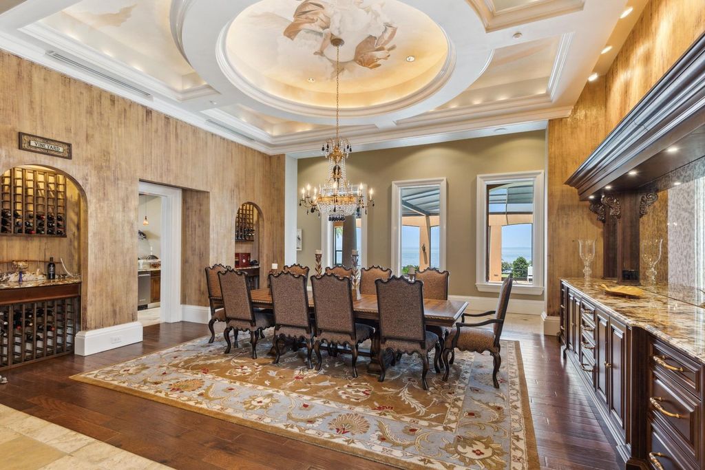 Featured on HGTV's Extreme Homes, this Tuscan-inspired masterpiece sits on a sprawling 1.87-acre lot, boasting over 400 feet of stunning water frontage along Choctawhatchee Bay and Jones Bayou.