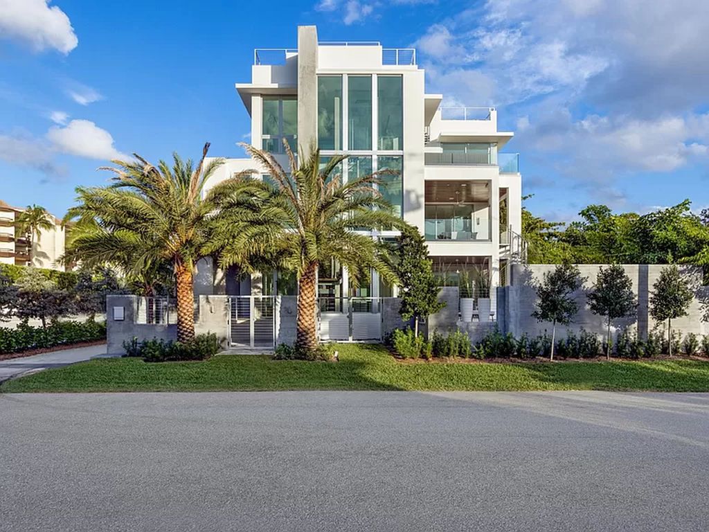 Just one block from the ocean, this 4-bed, 5-bath, 4,869 square feet residence features a Reina Sofia Museum-inspired glass-shaft elevator, balconies on each floor, and a roof terrace for an immersive coastal experience.