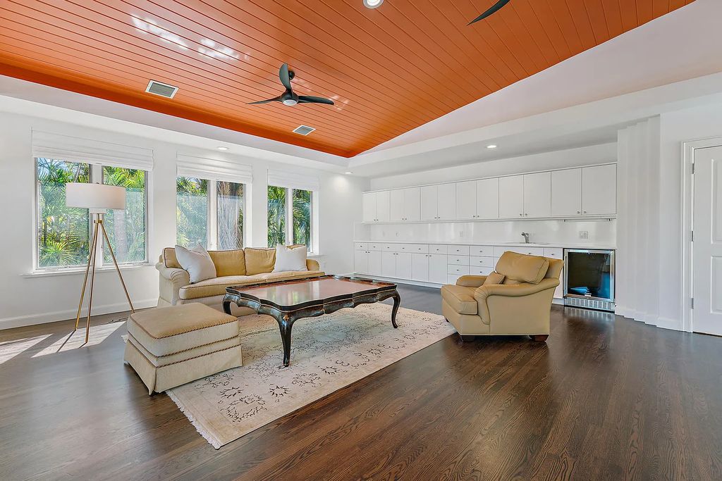 Featuring 8 bedrooms, 13 baths, and 9,306 square feet of space, this 1.55-acre property is ideal for boating enthusiasts.