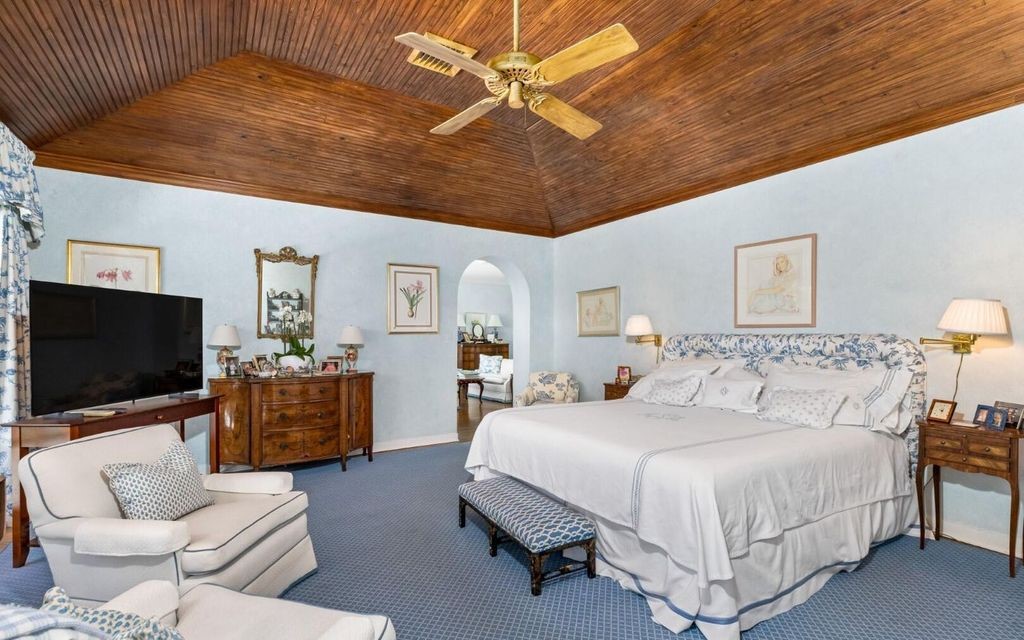 This exceptional 6BR/6.3BA Monterey-Style estate by Howard Major is a rare find on Palm Beach's exclusive El Bravo Way.