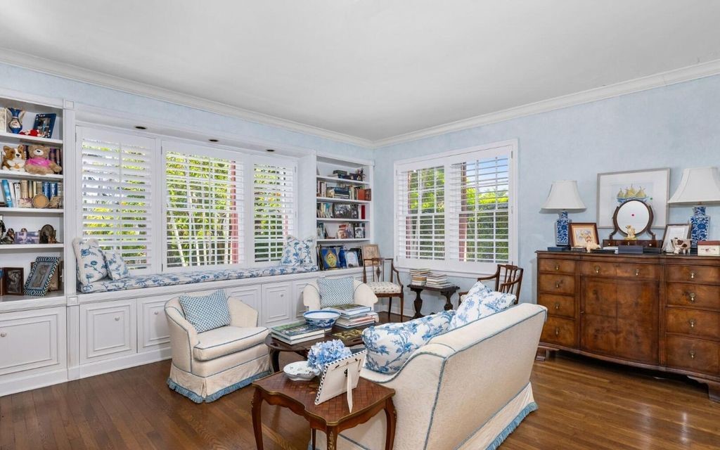 This exceptional 6BR/6.3BA Monterey-Style estate by Howard Major is a rare find on Palm Beach's exclusive El Bravo Way.