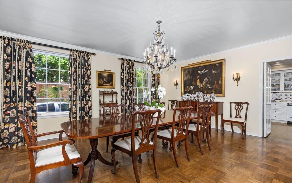 This exceptional 6BR/6.3BA Monterey-Style estate by Howard Major is a rare find on Palm Beach's exclusive El Bravo Way.