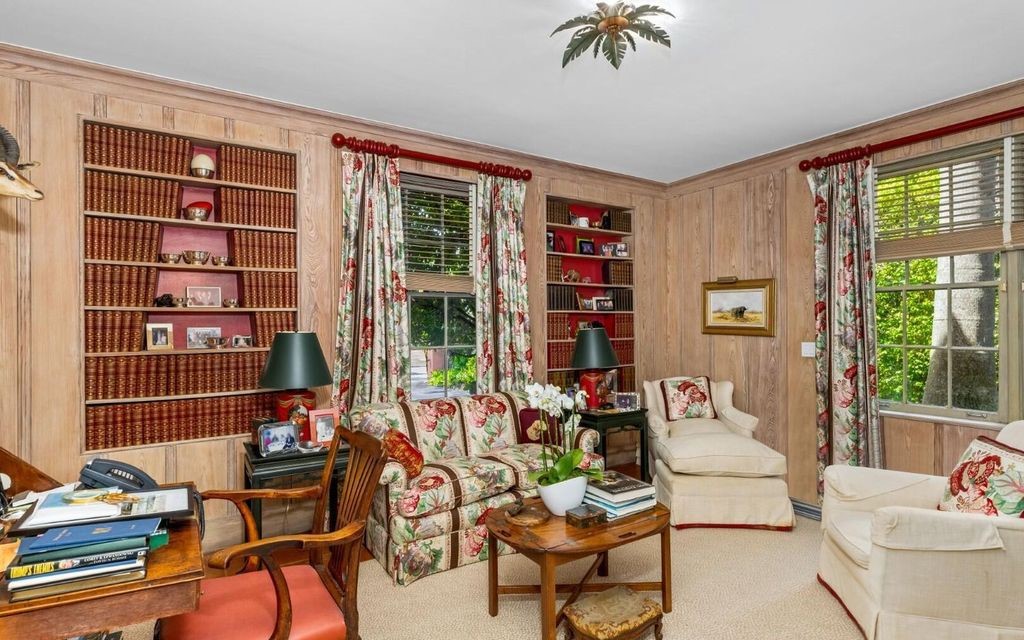 This exceptional 6BR/6.3BA Monterey-Style estate by Howard Major is a rare find on Palm Beach's exclusive El Bravo Way.