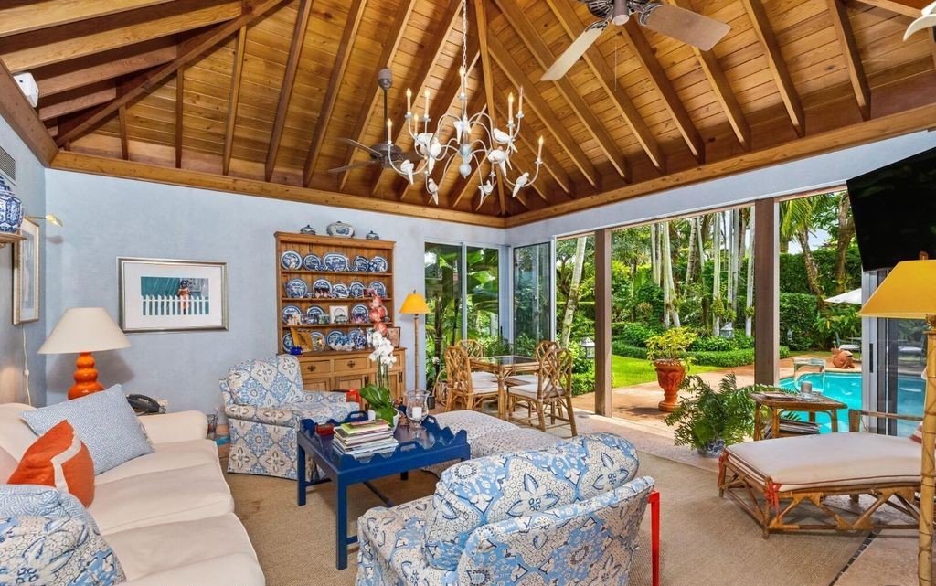 This exceptional 6BR/6.3BA Monterey-Style estate by Howard Major is a rare find on Palm Beach's exclusive El Bravo Way.