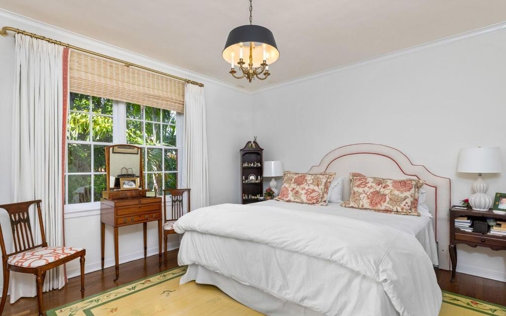 This exceptional 6BR/6.3BA Monterey-Style estate by Howard Major is a rare find on Palm Beach's exclusive El Bravo Way.