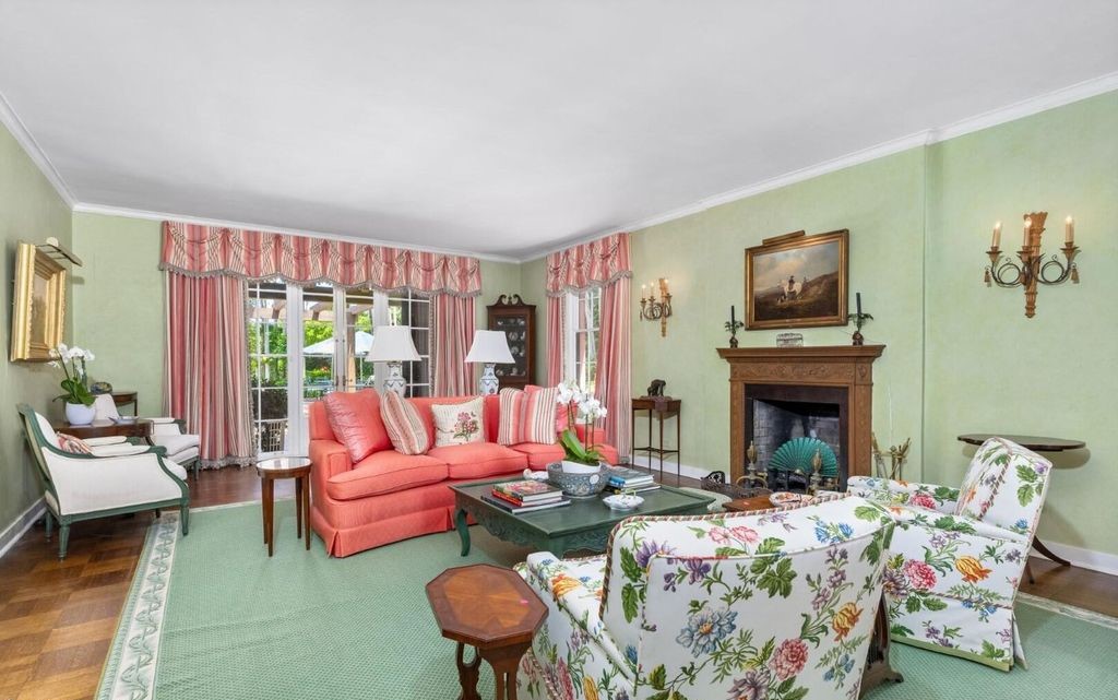 This exceptional 6BR/6.3BA Monterey-Style estate by Howard Major is a rare find on Palm Beach's exclusive El Bravo Way.