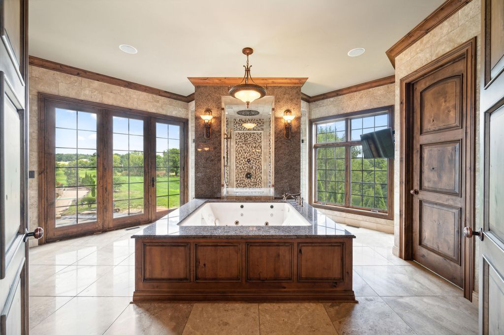 Enchanting French Country Estate with Picturesque Bridges Creeks and Castle Like Facade in Indiana Listed for 4.65 Million 21
