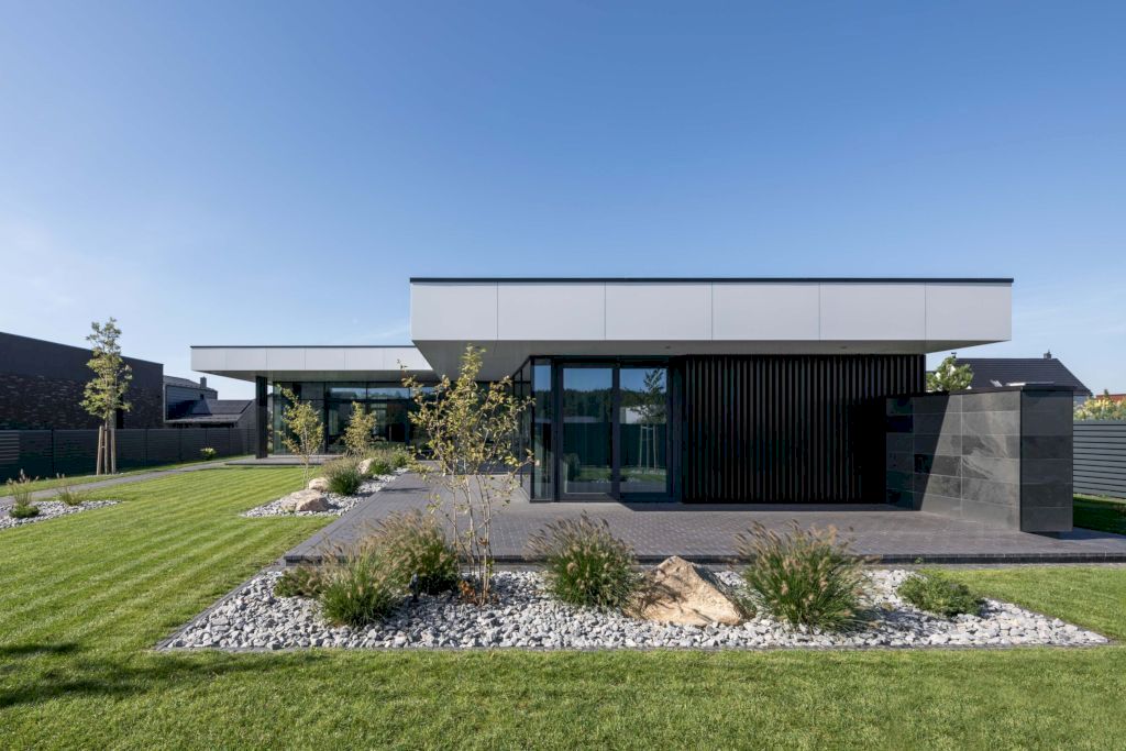 N House A Modern Retreat Framed by Nature by ArchLAB studio 16