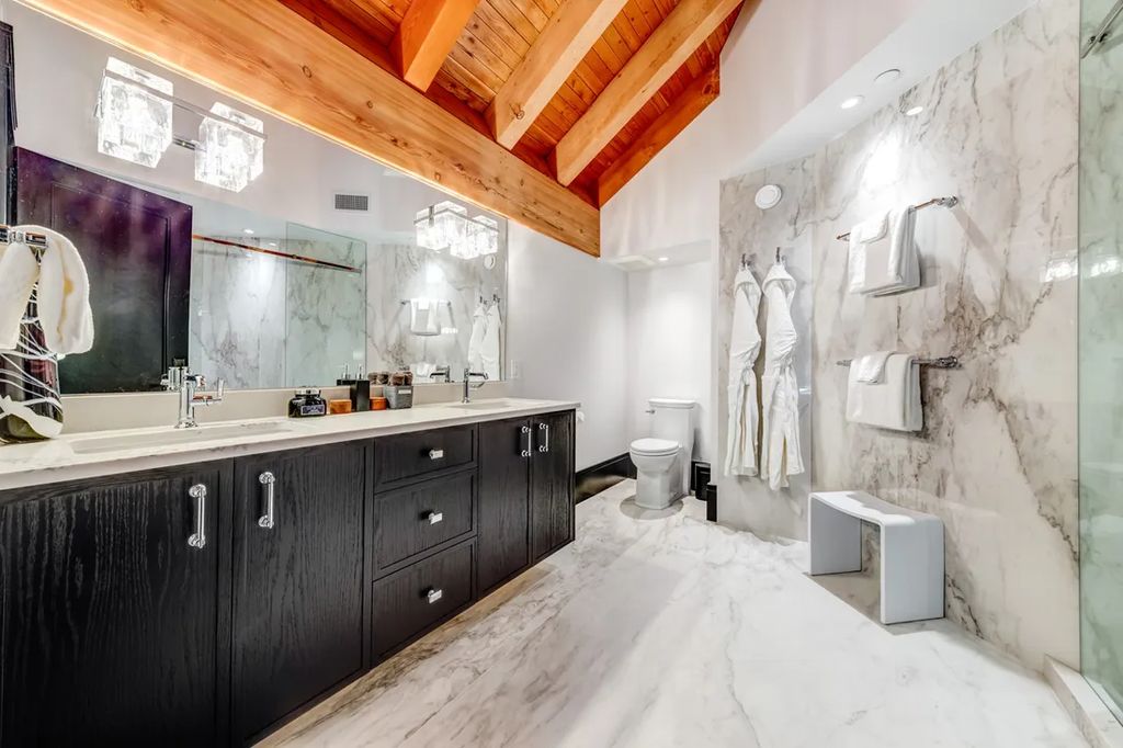 A Winter Wonderland Ski InSki Out Home with Panoramic Mountain Views for C14.9 Million in Canada 25
