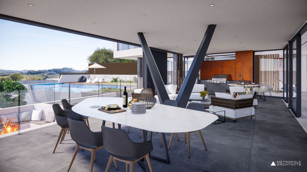 Beachcroft House Coastal Elegance by Metropole Architects 24
