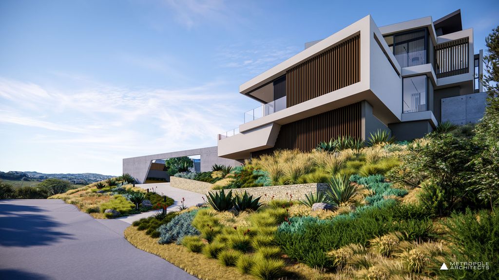 Beachcroft House Coastal Elegance by Metropole Architects 26