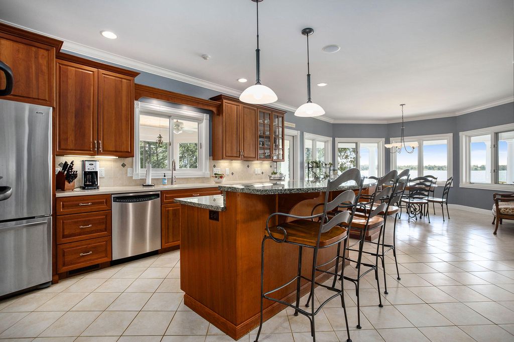 Breathtaking Sunsets and Unparalleled Comfort Premier Lake Home Available for 5.295 Million 11