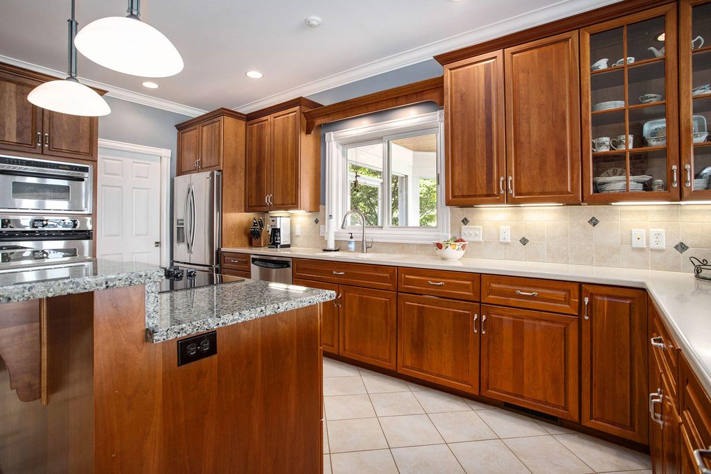 Breathtaking Sunsets and Unparalleled Comfort Premier Lake Home Available for 5.295 Million 12