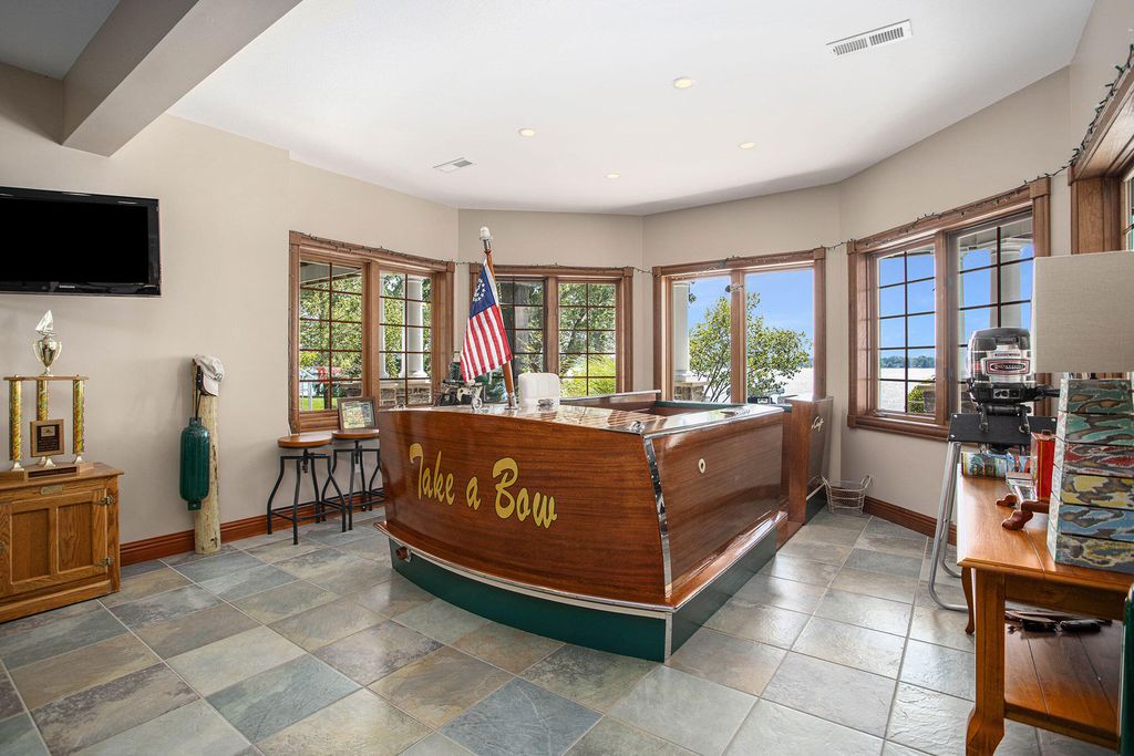 Breathtaking Sunsets and Unparalleled Comfort Premier Lake Home Available for 5.295 Million 43