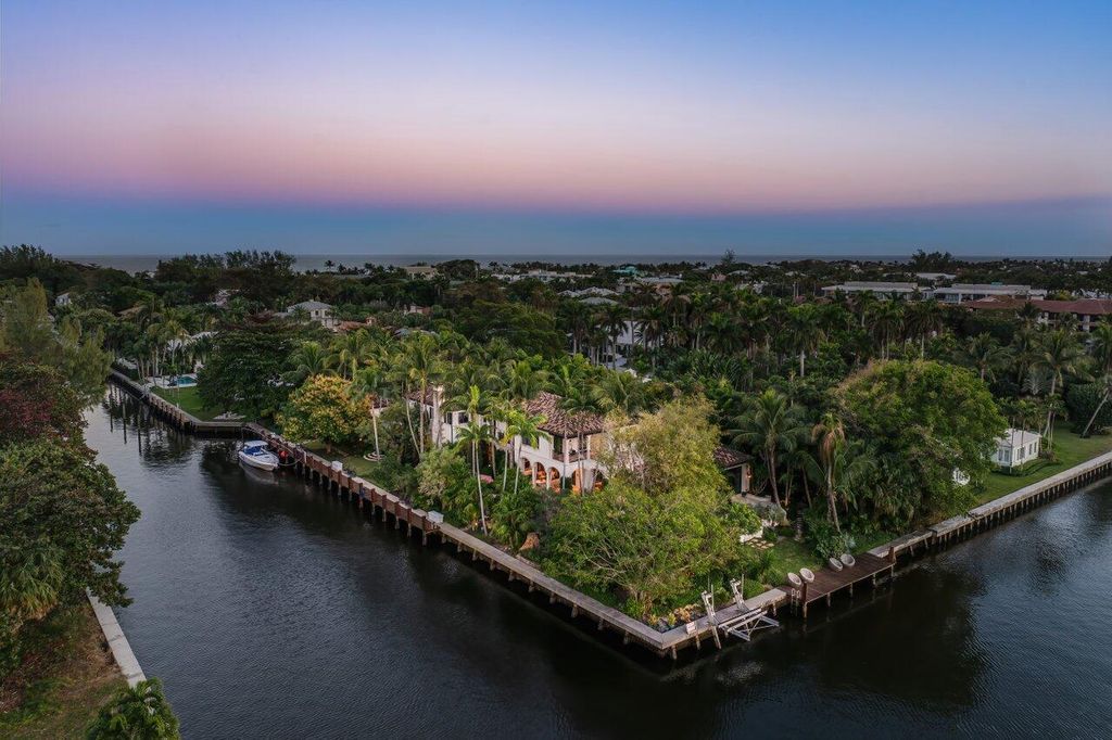 Extraordinary Waterfront Estate with 446' Intracoastal Frontage, Resort-Style Pool and Two Docks in Gulf Stream Listed at $17.9 Million 5 Designed by Randall Stofft and elegantly finished by Marc Michaels Interiors, this 7,293 square feet masterpiece offers 6 bedrooms, including a private guest house, and 8 baths.