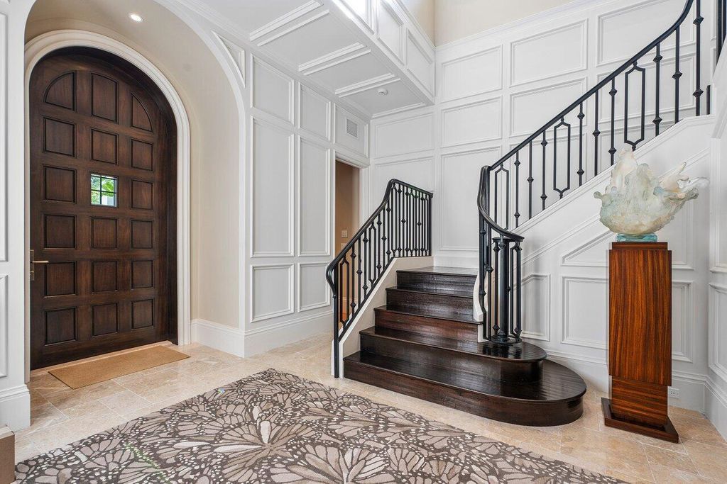 Extraordinary Waterfront Estate with 446' Intracoastal Frontage, Resort-Style Pool and Two Docks in Gulf Stream Listed at $17.9 Million 17 Designed by Randall Stofft and elegantly finished by Marc Michaels Interiors, this 7,293 square feet masterpiece offers 6 bedrooms, including a private guest house, and 8 baths.