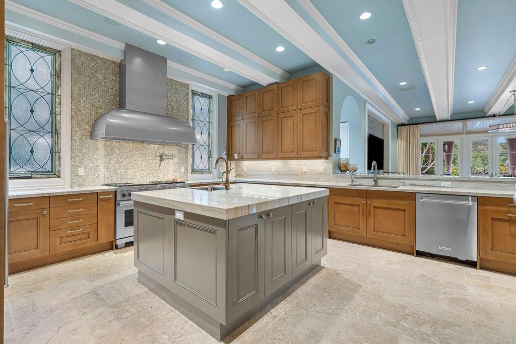 Extraordinary Waterfront Estate with 446' Intracoastal Frontage, Resort-Style Pool and Two Docks in Gulf Stream Listed at $17.9 Million 22 Designed by Randall Stofft and elegantly finished by Marc Michaels Interiors, this 7,293 square feet masterpiece offers 6 bedrooms, including a private guest house, and 8 baths.