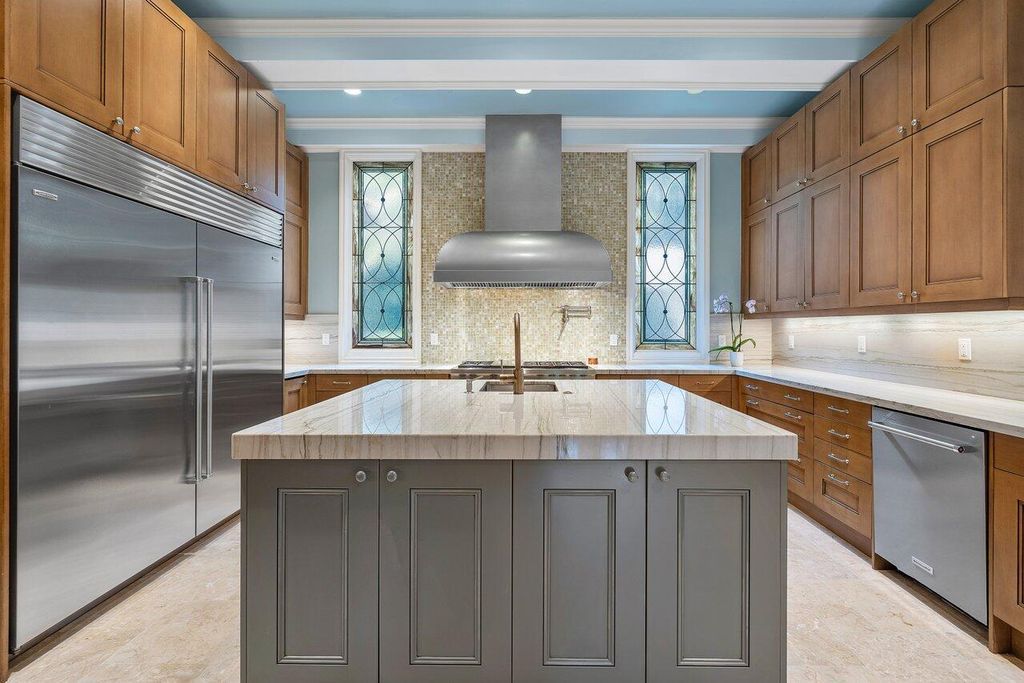 Extraordinary Waterfront Estate with 446' Intracoastal Frontage, Resort-Style Pool and Two Docks in Gulf Stream Listed at $17.9 Million 23 Designed by Randall Stofft and elegantly finished by Marc Michaels Interiors, this 7,293 square feet masterpiece offers 6 bedrooms, including a private guest house, and 8 baths.