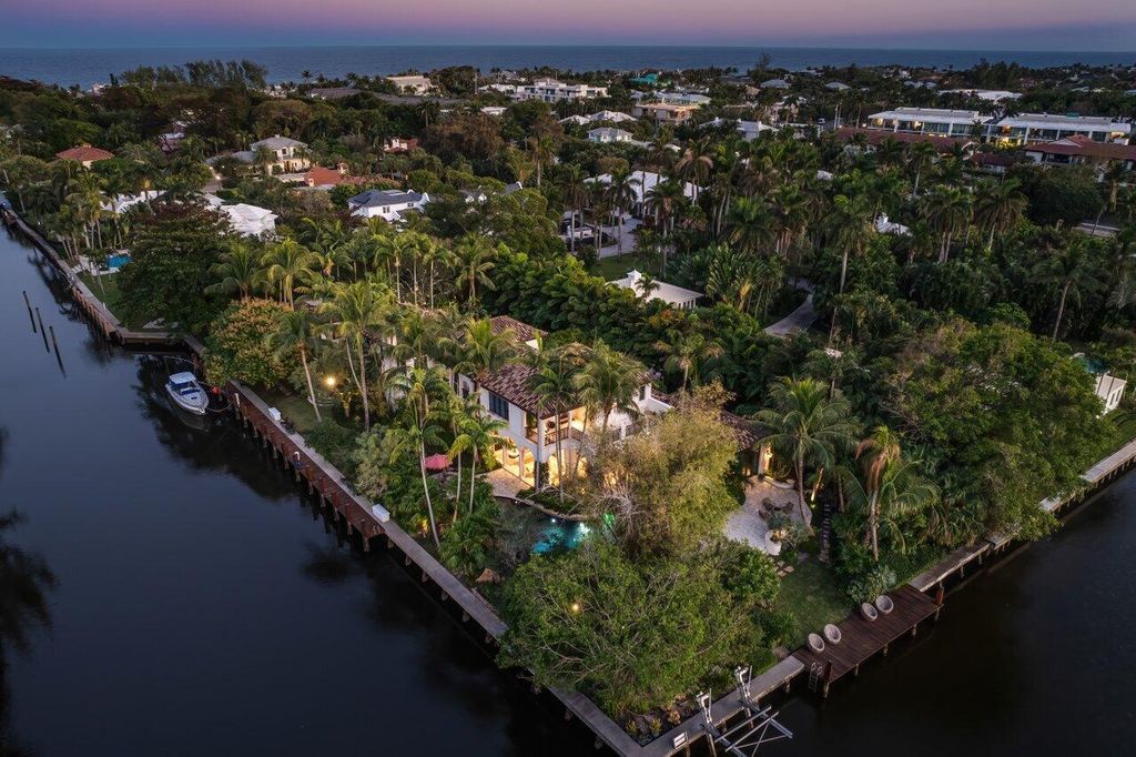 Extraordinary Waterfront Estate with 446' Intracoastal Frontage, Resort-Style Pool and Two Docks in Gulf Stream Listed at $17.9 Million 6 Designed by Randall Stofft and elegantly finished by Marc Michaels Interiors, this 7,293 square feet masterpiece offers 6 bedrooms, including a private guest house, and 8 baths.