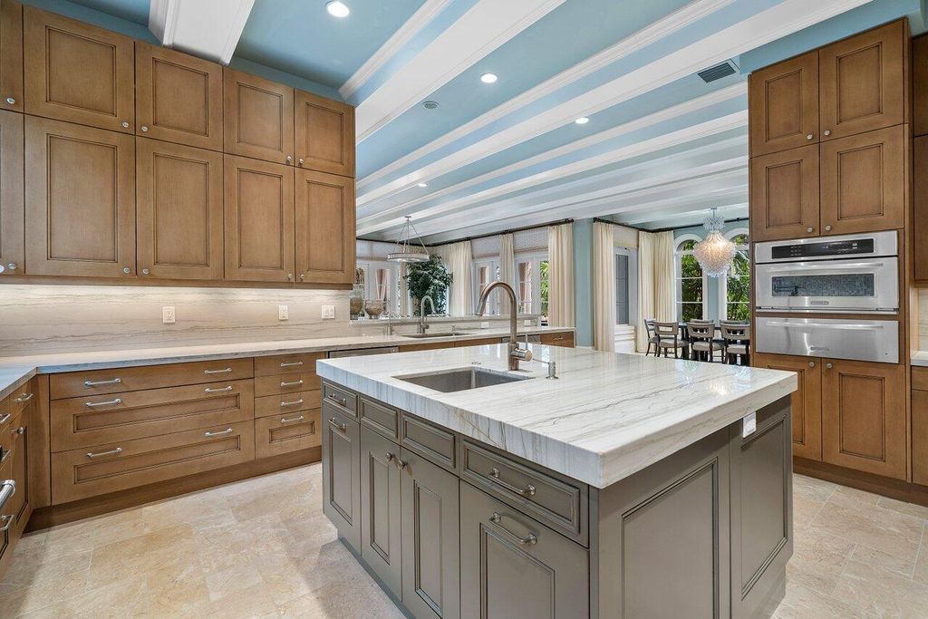 Extraordinary Waterfront Estate with 446' Intracoastal Frontage, Resort-Style Pool and Two Docks in Gulf Stream Listed at $17.9 Million 24 Designed by Randall Stofft and elegantly finished by Marc Michaels Interiors, this 7,293 square feet masterpiece offers 6 bedrooms, including a private guest house, and 8 baths.