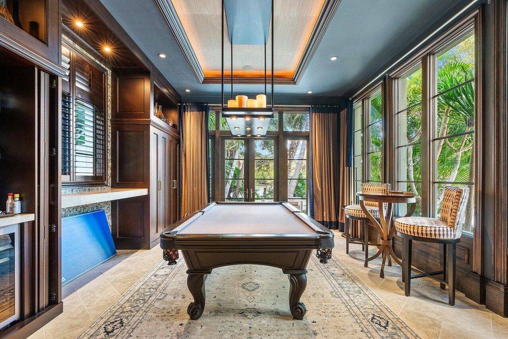 Extraordinary Waterfront Estate with 446' Intracoastal Frontage, Resort-Style Pool and Two Docks in Gulf Stream Listed at $17.9 Million 32 Designed by Randall Stofft and elegantly finished by Marc Michaels Interiors, this 7,293 square feet masterpiece offers 6 bedrooms, including a private guest house, and 8 baths.
