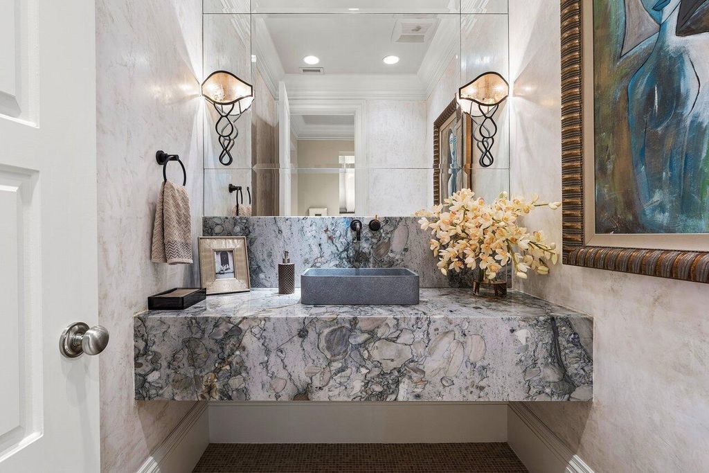 Extraordinary Waterfront Estate with 446' Intracoastal Frontage, Resort-Style Pool and Two Docks in Gulf Stream Listed at $17.9 Million 33 Designed by Randall Stofft and elegantly finished by Marc Michaels Interiors, this 7,293 square feet masterpiece offers 6 bedrooms, including a private guest house, and 8 baths.