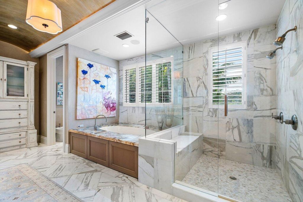 Extraordinary Waterfront Estate with 446' Intracoastal Frontage, Resort-Style Pool and Two Docks in Gulf Stream Listed at $17.9 Million 37 Designed by Randall Stofft and elegantly finished by Marc Michaels Interiors, this 7,293 square feet masterpiece offers 6 bedrooms, including a private guest house, and 8 baths.
