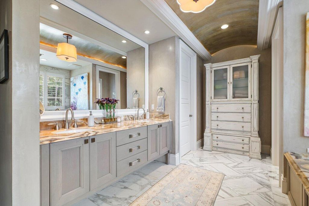 Extraordinary Waterfront Estate with 446' Intracoastal Frontage, Resort-Style Pool and Two Docks in Gulf Stream Listed at $17.9 Million 38 Designed by Randall Stofft and elegantly finished by Marc Michaels Interiors, this 7,293 square feet masterpiece offers 6 bedrooms, including a private guest house, and 8 baths.