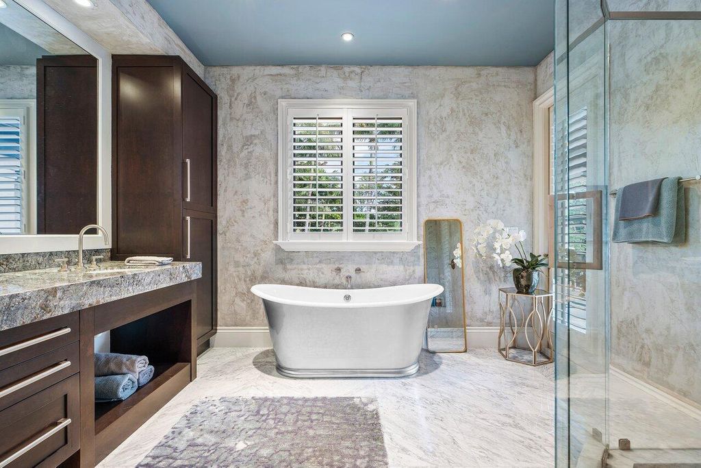 Extraordinary Waterfront Estate with 446' Intracoastal Frontage, Resort-Style Pool and Two Docks in Gulf Stream Listed at $17.9 Million 40 Designed by Randall Stofft and elegantly finished by Marc Michaels Interiors, this 7,293 square feet masterpiece offers 6 bedrooms, including a private guest house, and 8 baths.