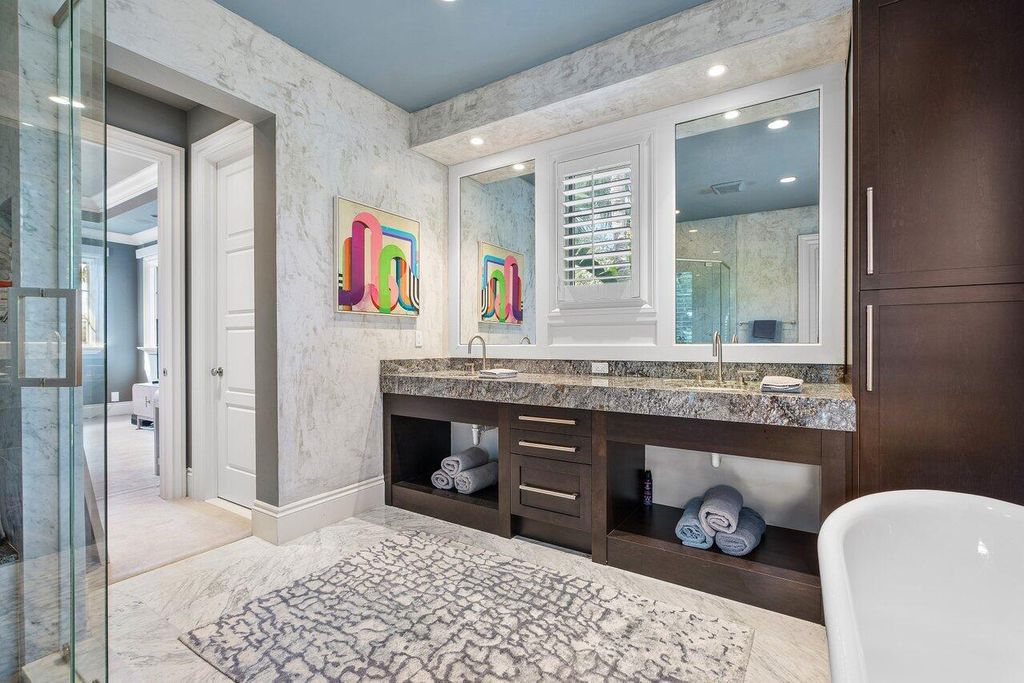 Extraordinary Waterfront Estate with 446' Intracoastal Frontage, Resort-Style Pool and Two Docks in Gulf Stream Listed at $17.9 Million 41 Designed by Randall Stofft and elegantly finished by Marc Michaels Interiors, this 7,293 square feet masterpiece offers 6 bedrooms, including a private guest house, and 8 baths.