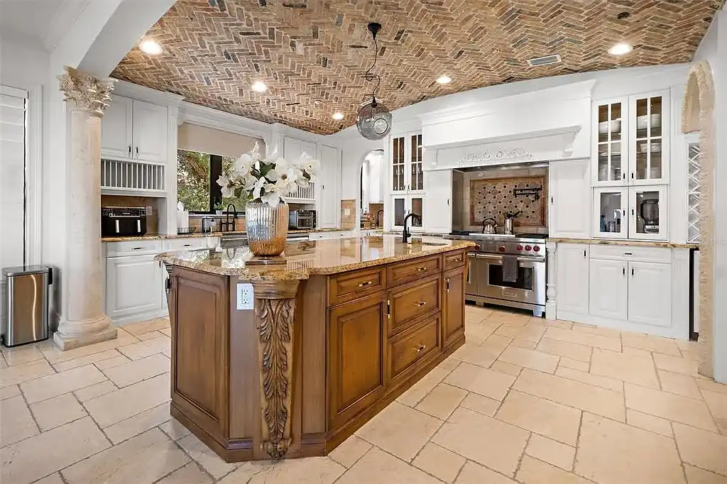 Luxury Mediterranean-style waterfront home at 1011 Rhodes Villa Ave, Delray Beach, featuring stunning architecture and direct Intracoastal Waterway access.
