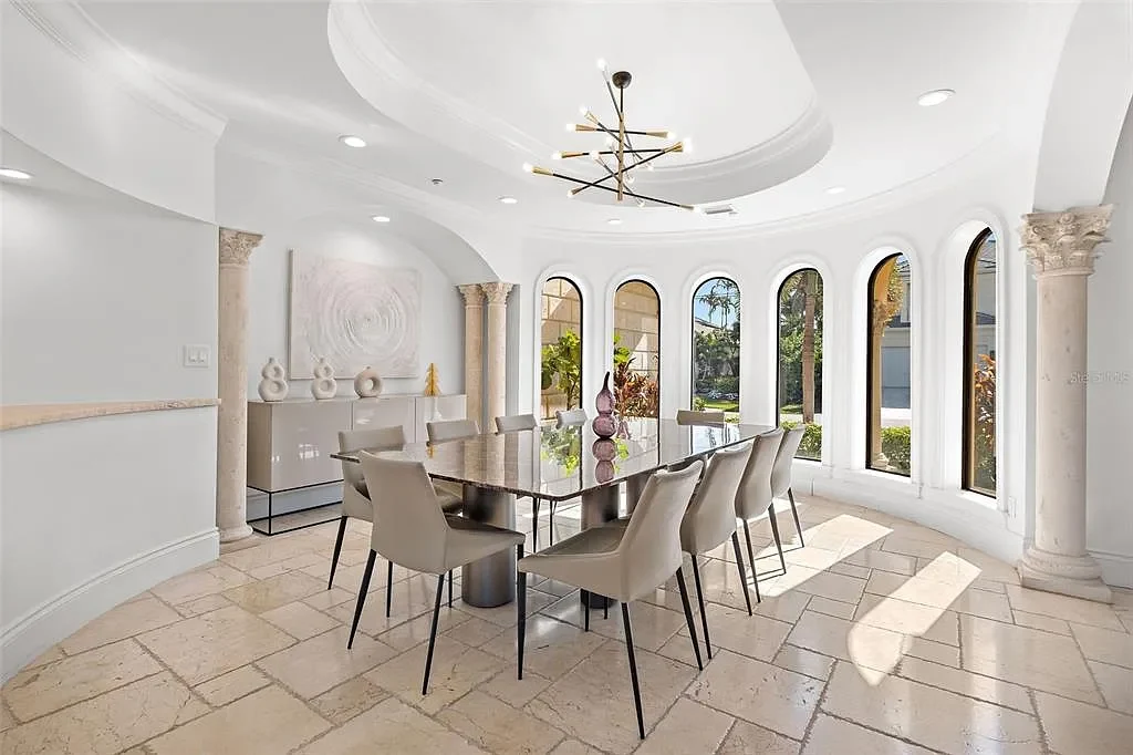 Luxury Mediterranean-style waterfront home at 1011 Rhodes Villa Ave, Delray Beach, featuring stunning architecture and direct Intracoastal Waterway access.
