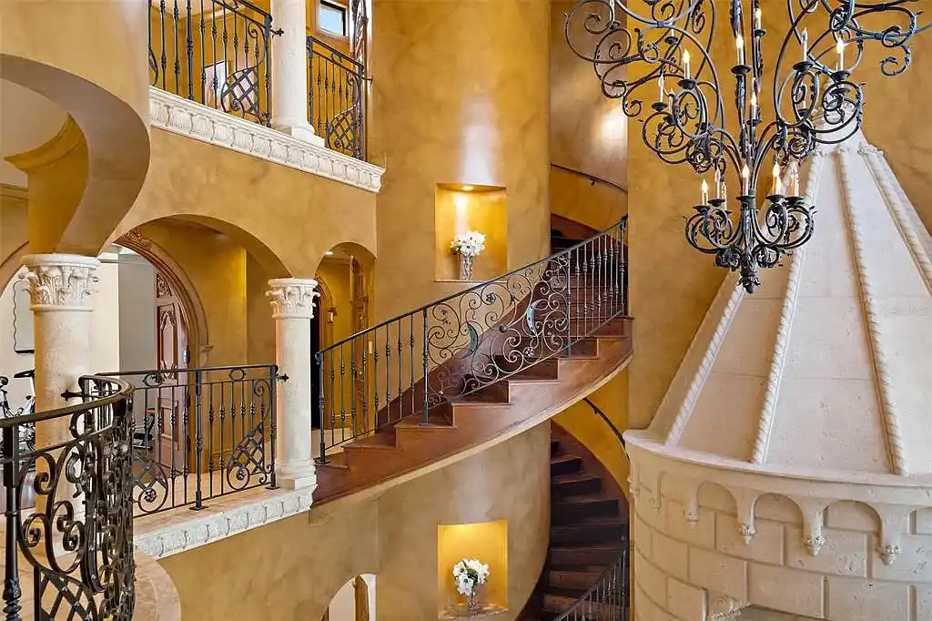 Luxury Mediterranean-style waterfront home at 1011 Rhodes Villa Ave, Delray Beach, featuring stunning architecture and direct Intracoastal Waterway access.