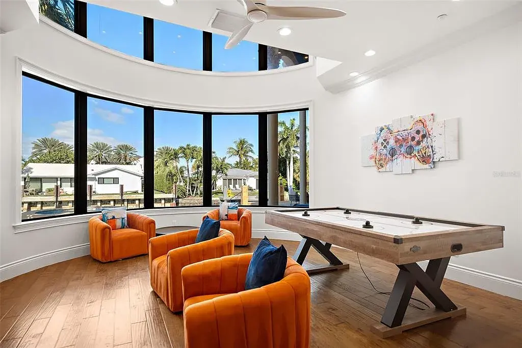Luxury Mediterranean-style waterfront home at 1011 Rhodes Villa Ave, Delray Beach, featuring stunning architecture and direct Intracoastal Waterway access.