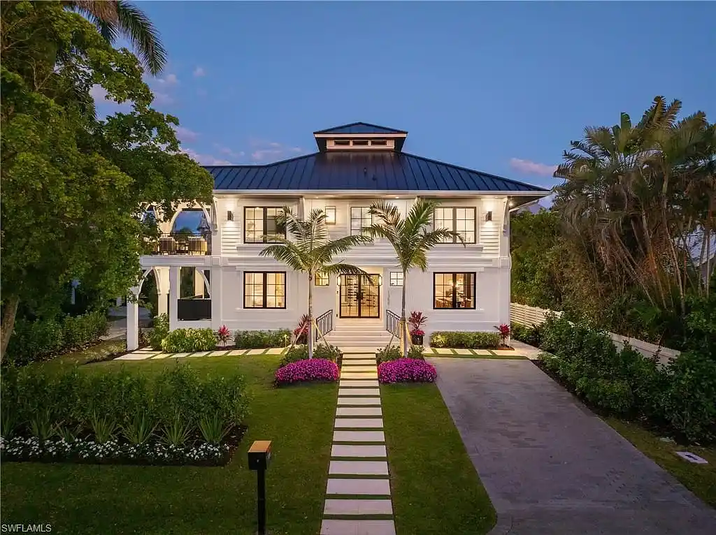 Luxury smart home at 1355 4th St S, equipped with Control4 automation, security cameras, and impact-resistant windows for seamless modern living.