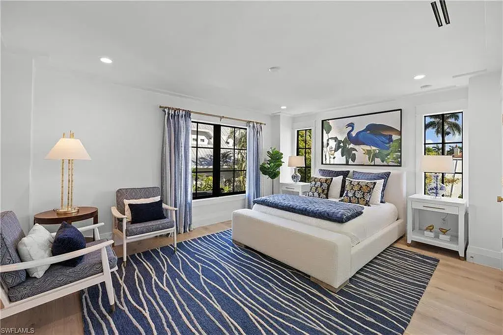 Luxury smart home at 1355 4th St S, equipped with Control4 automation, security cameras, and impact-resistant windows for seamless modern living.