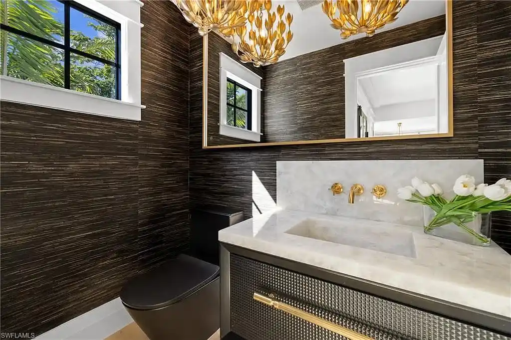 Luxury smart home at 1355 4th St S, equipped with Control4 automation, security cameras, and impact-resistant windows for seamless modern living.