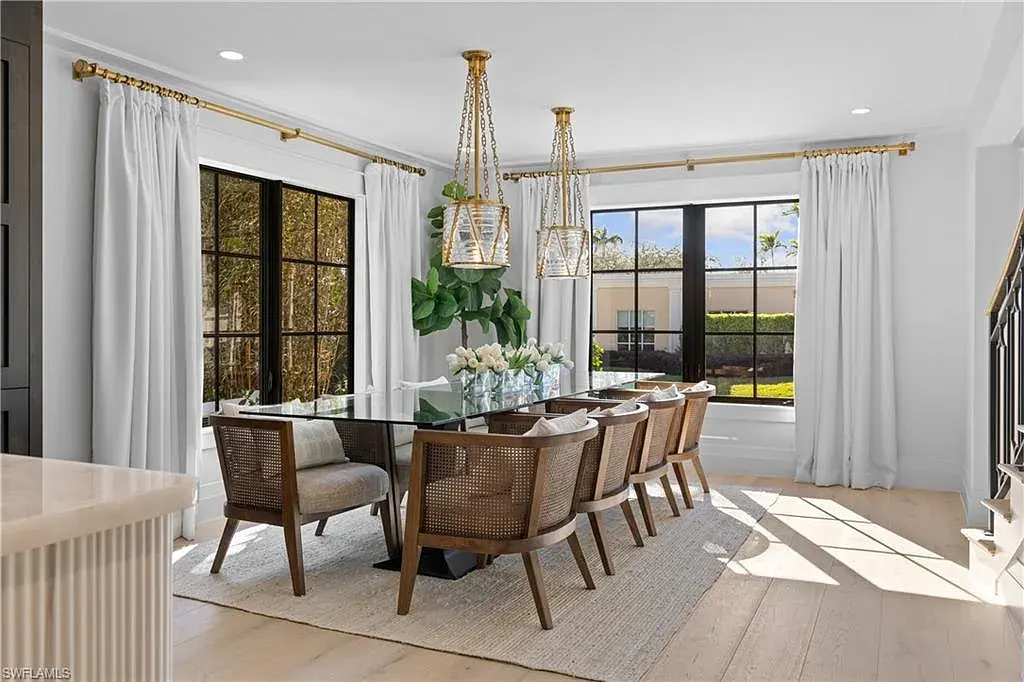 Luxury smart home at 1355 4th St S, equipped with Control4 automation, security cameras, and impact-resistant windows for seamless modern living.