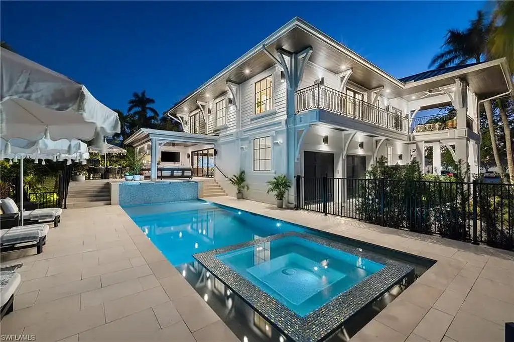 Luxury smart home at 1355 4th St S, equipped with Control4 automation, security cameras, and impact-resistant windows for seamless modern living.