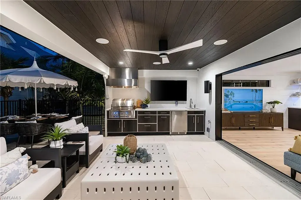 Luxury smart home at 1355 4th St S, equipped with Control4 automation, security cameras, and impact-resistant windows for seamless modern living.