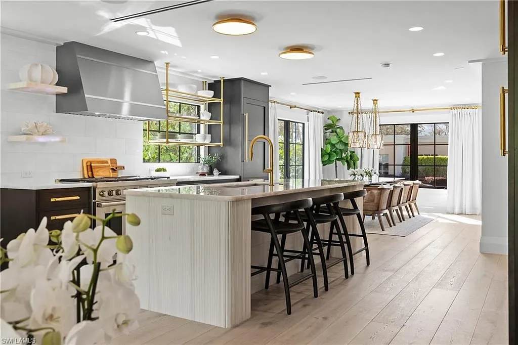 Luxury smart home at 1355 4th St S, equipped with Control4 automation, security cameras, and impact-resistant windows for seamless modern living.