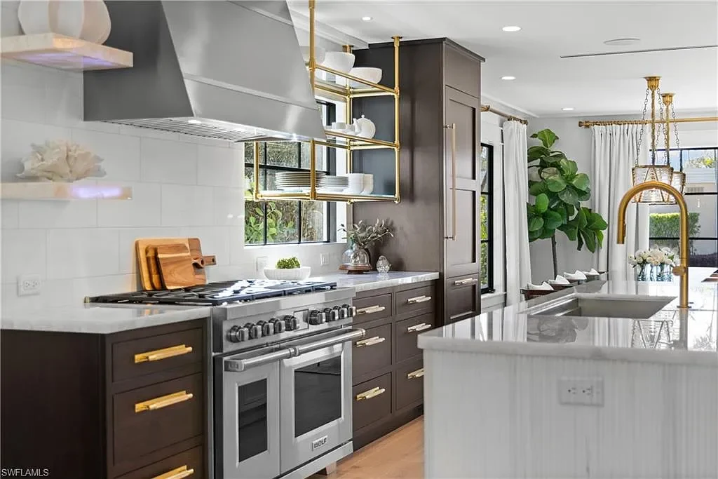 Luxury smart home at 1355 4th St S, equipped with Control4 automation, security cameras, and impact-resistant windows for seamless modern living.
