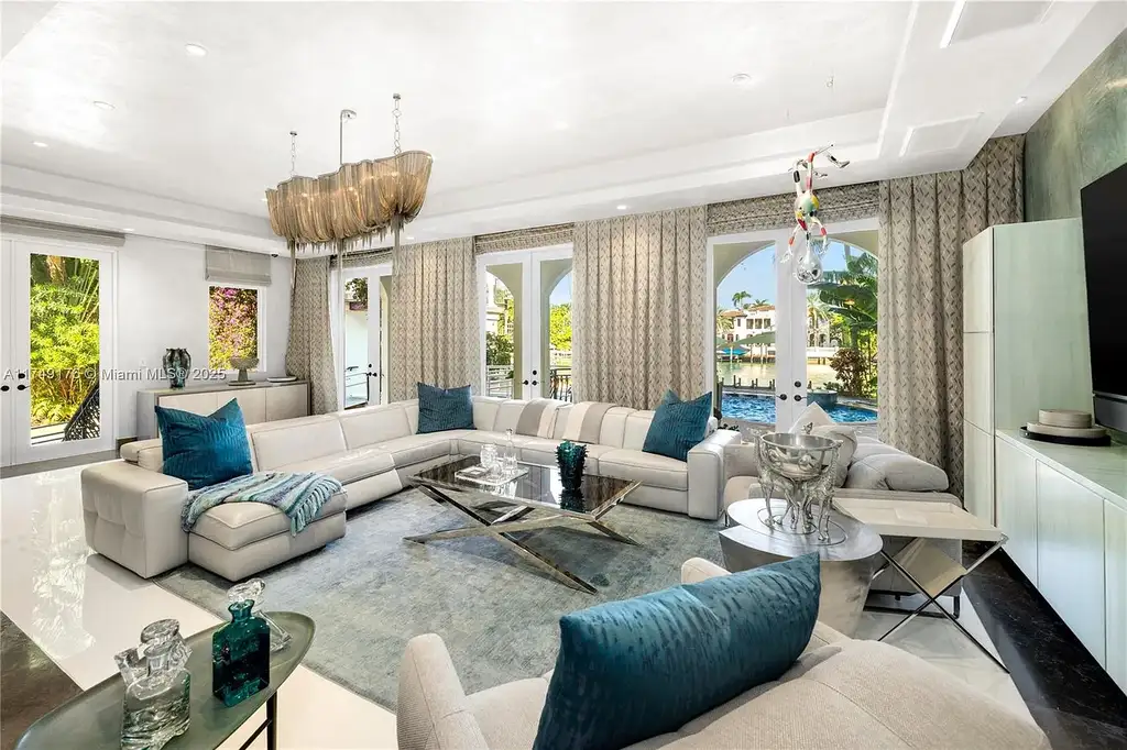 Luxury $39.5M Miami Beach waterfront estate at 1535 W 27th St, featuring a private dock, resort-style pool, and Mediterranean-inspired architecture.