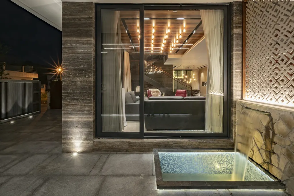 The Waterfall House by Space Race Architects A Serene Urban Retreat in Jalandhar 7