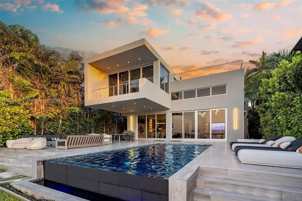 Modern open-concept living room in Miami Beach home for sale with custom stone finishes